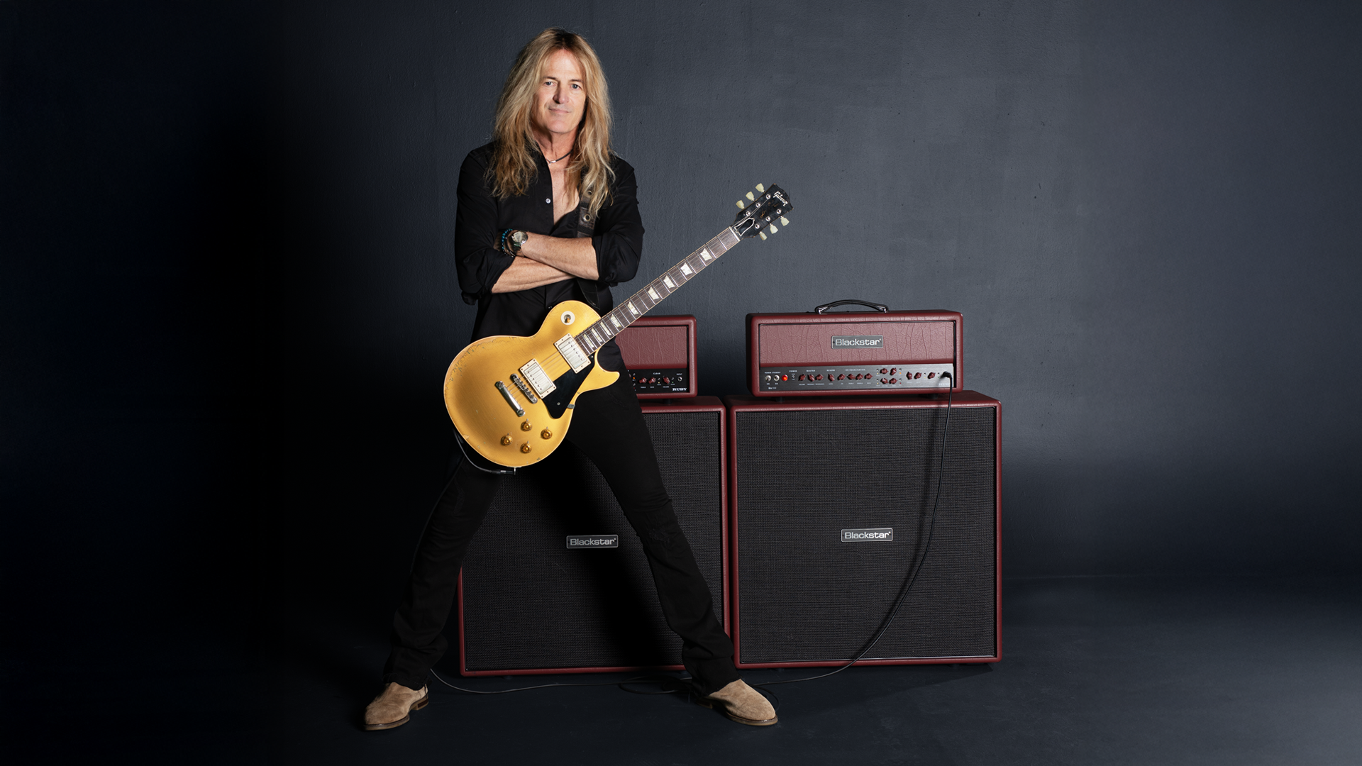 Doug Aldrich with his signature Blackstar DA100 Ruby amp head and DA412B cab