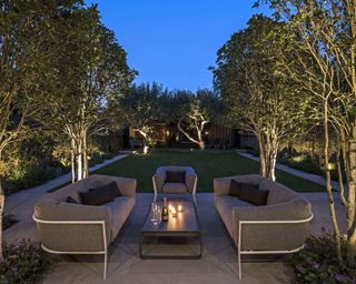 seating area in modern garden with lighting