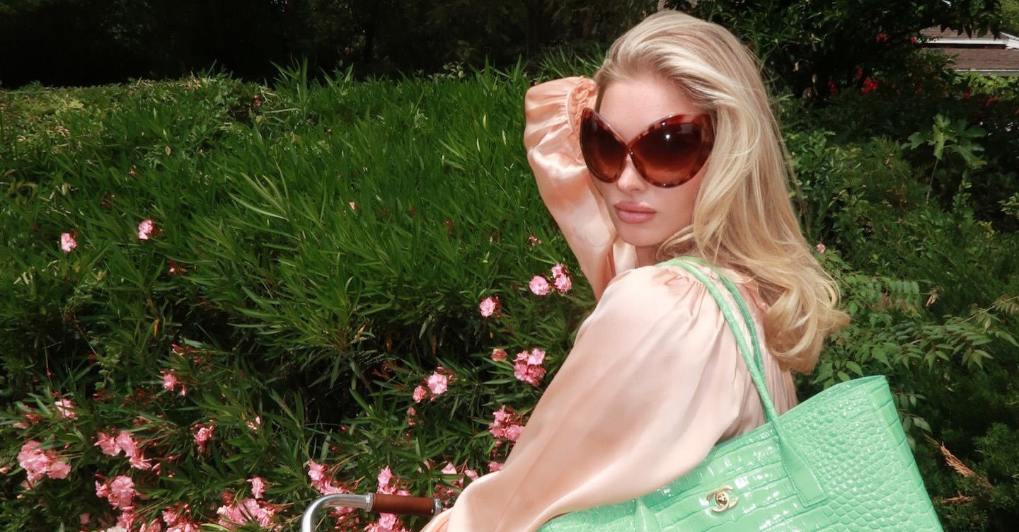 Elsa Hosk wearing the D&Ocirc;EN Cicely Dress, mint green Chanel Small Tote, and Miu Miu Gymnasium Sneakers