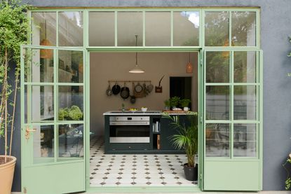 A kitchen with patterned flooring