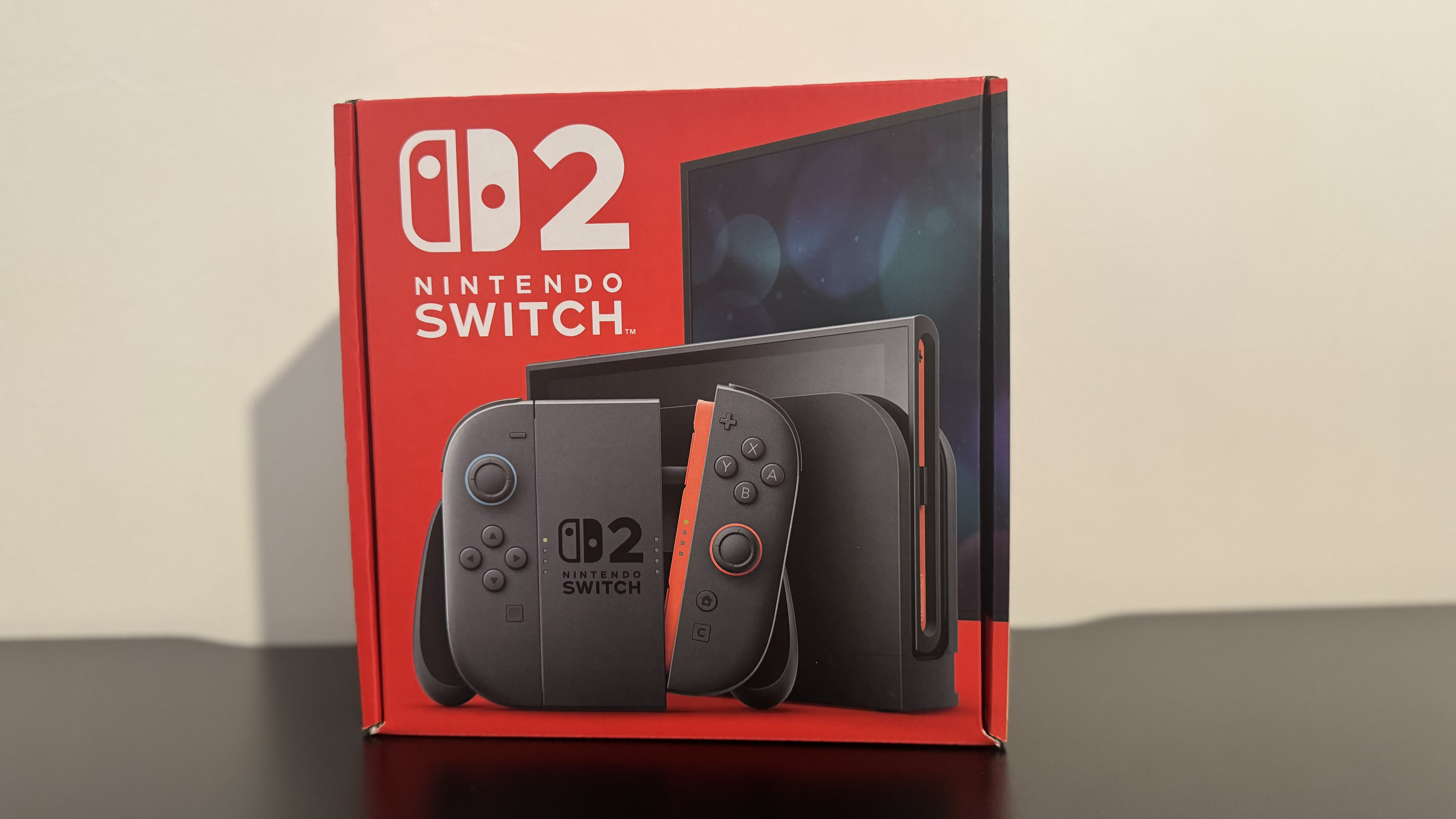 Nintendo Switch 2 box, in front of a white wall