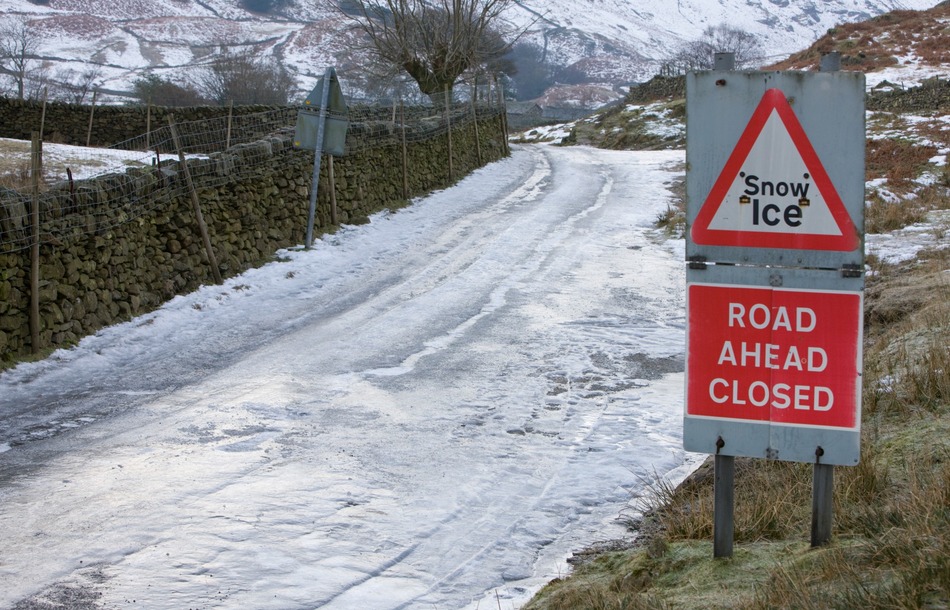 Ice covered country lane in the Lake District, Cumbria, UK.