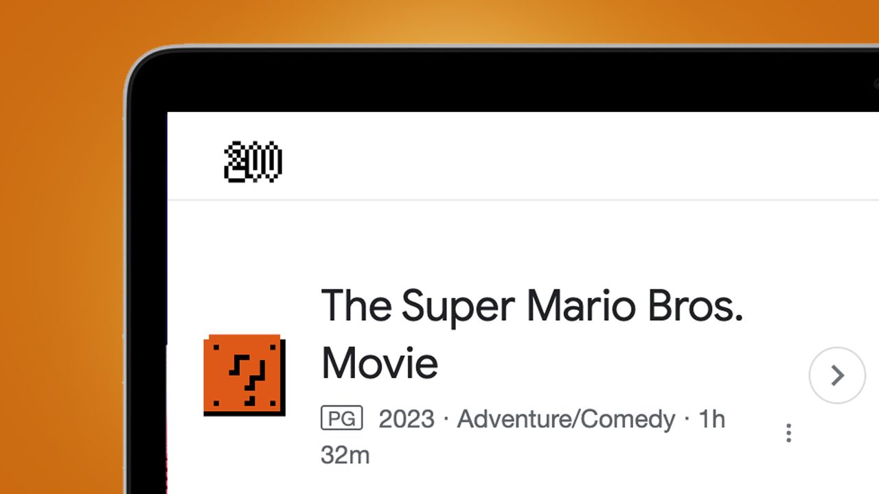 A laptop screen on an orange background showing the Google Super Mario Bros easter egg
