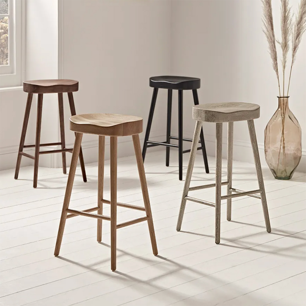 four wooden bar stools