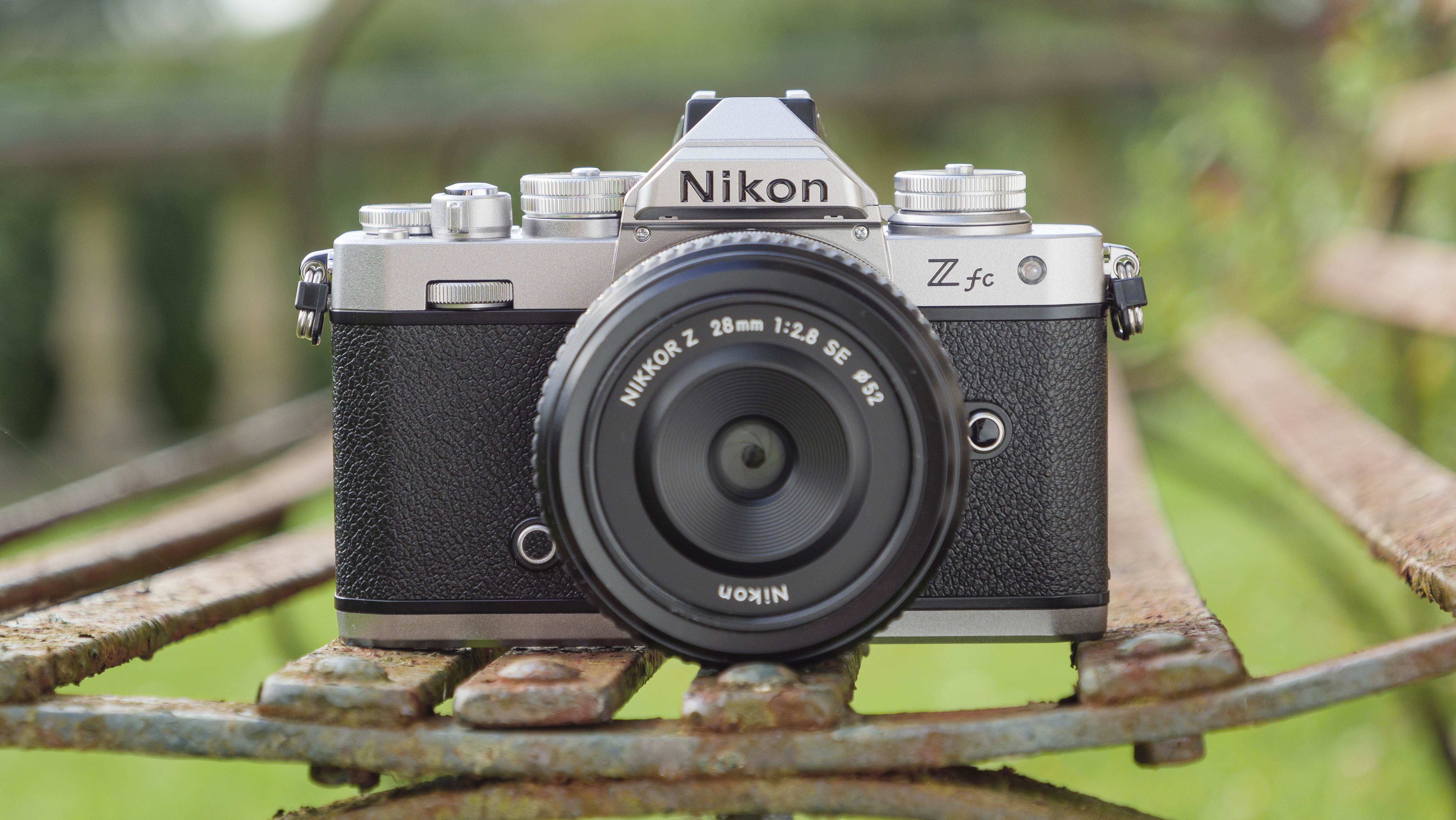 The Nikon Z fc camera on a park bench