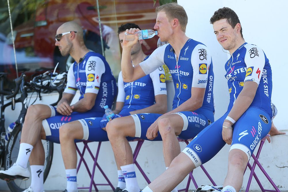 Quick-Step riders wait for stage 7 to start.