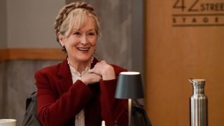 Meryl Streep smiling at a table read in Season 3 of Only Murders in the Building.