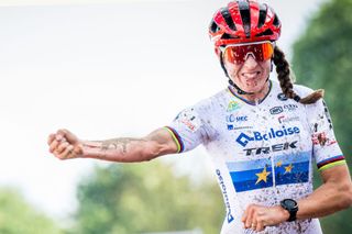 Lucinda Brand celebrates as she crosses the finish line to win the women's elite race of the Berencross Meulebeke