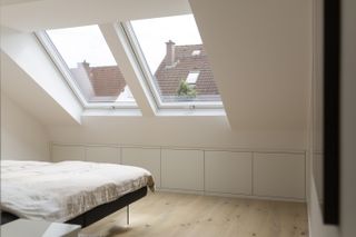 a duo of rooflights in a loft bedroom