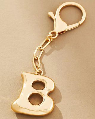 By Anthropologie, Bubble Letter Bag Charm