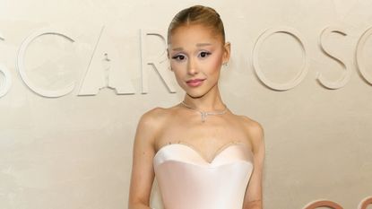 Ariana Grande in a pale pink gown at the Oscars