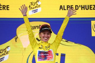 ALPE DHUEZ FRANCE AUGUST 18 Katarzyna Niewiadoma of Poland and Team CanyonSRAM Racing Yellow Leader Jersey celebrates at podium as final overall race winner during the 3rd Tour de France Femmes 2024 Stage 8 a 1499km stage from Le GrandBornand to Alpe dHuez 1828m UCIWWT on August 18 2024 in Alpe dHuez France Photo by Alex BroadwayGetty Images