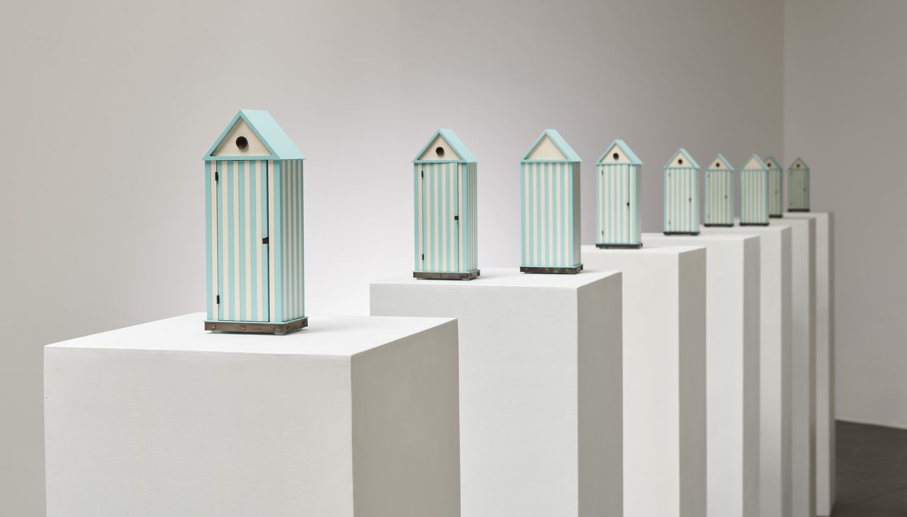 Models of Cabina dell&#039;Elba – beach hut-inspired wardrobes – by Aldo Rossi on plinths in gallery