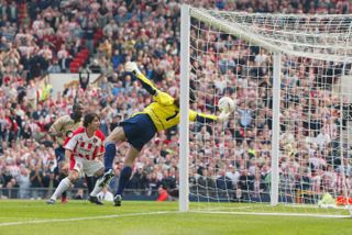 Arsenal goalkeeper David Seaman makes an incredible save to keep out Paul Peschisolido's header in the 2003 FA Cup semi-final against Sheffield United