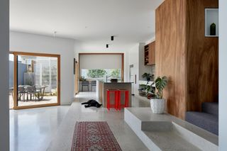 a modern living space with concrete floors