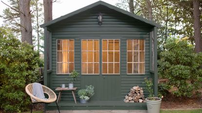 Green garden shed painted in a Ronseal paint