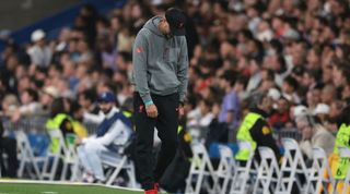 Jurgen Klopp hangs his head during Liverpool's Champions League exit to Real Madrid 