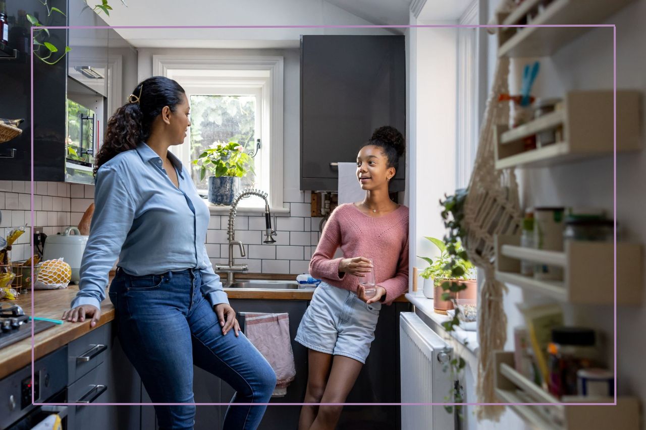 woman and teenager talking in the kitchen