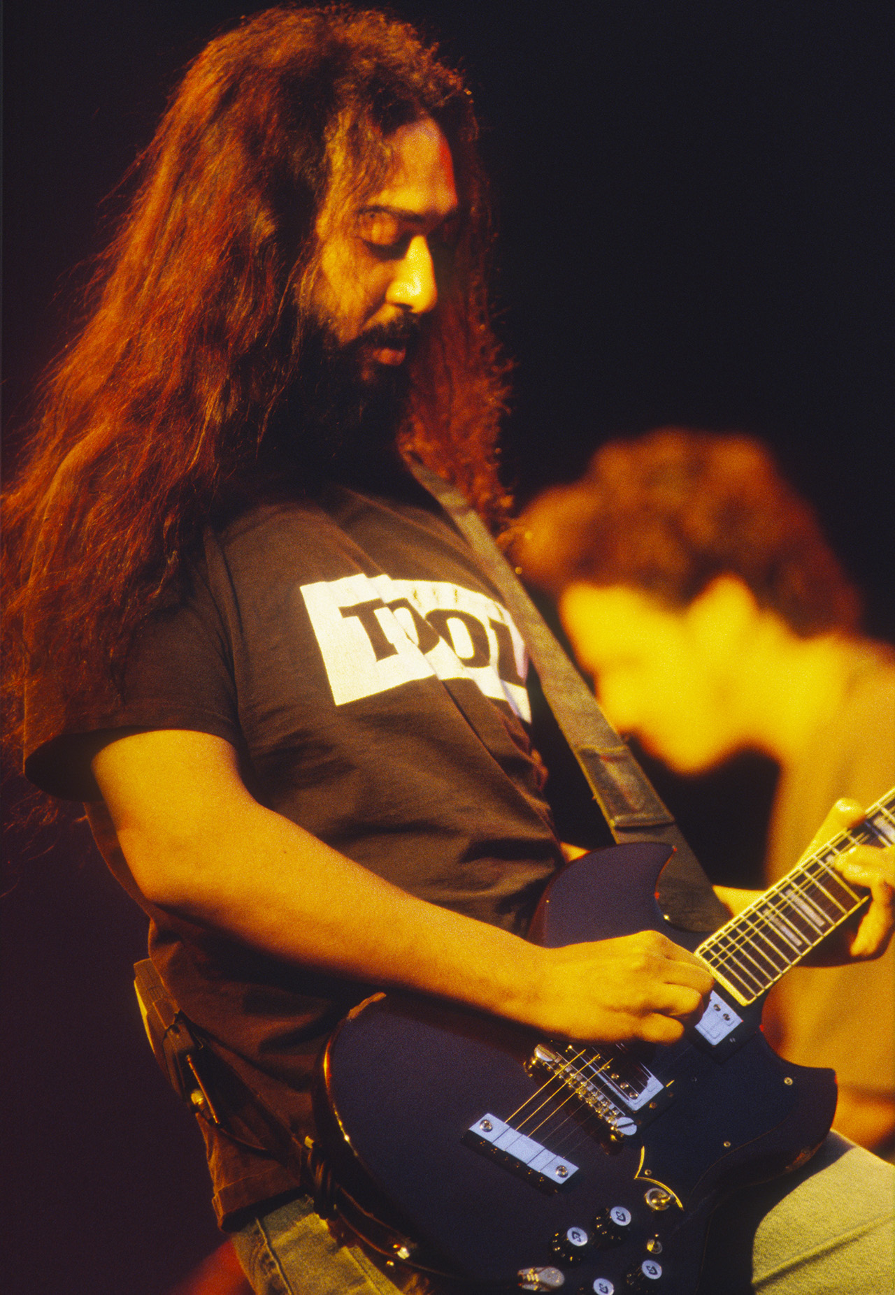 Guitarist Kim Thayil, wearing Tool t-shirt, performs with American rock group, Soundgarden at the Pukkelpop Festival, Hasselt, Belgium, 26th August 1995.