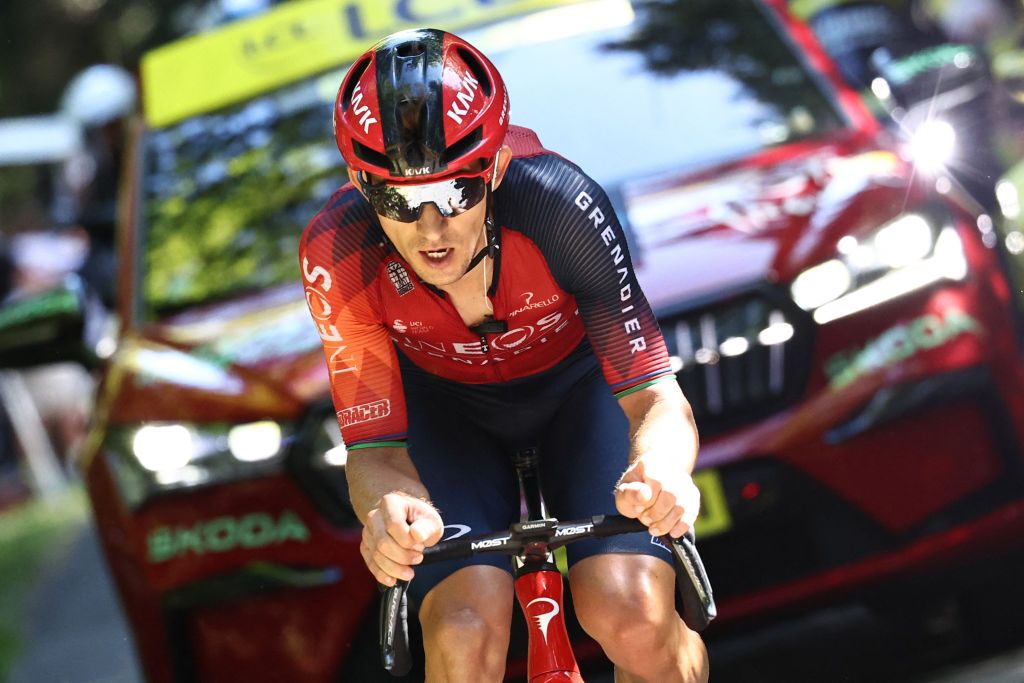 INEOS - Grenadiers' Polish rider Michal Kwiatkowski cycles in the final ascent of Col du Grand Combier in the final kilometeres of the 13th stage of the 110th edition of the Tour de France cycling race, 138 km between Chatillon-sur-Chalaronne in central-eastern France and Grand Colombier, in the Jura mountains in Eastern France, on July 14, 2023. (Photo by Anne-Christine POUJOULAT / AFP)