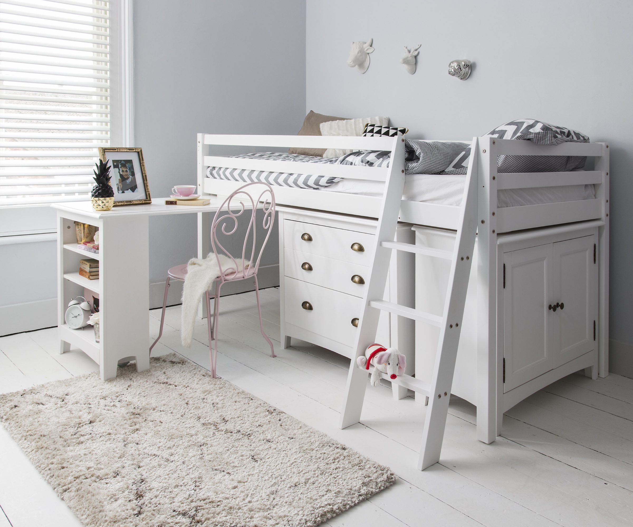 child&#039;s bedroom with cabin bed and desk, white floor, pale rug, blinds at window