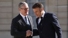 Keir Starmer shaking hands with Emmanuel Macron outside the Elysee Palace in March 2025