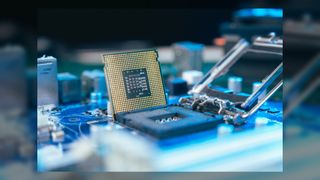 A central processing unit (CPU) laying on the table with the computer hardware components_Narumon Bowonkitwanchai via Getty Images