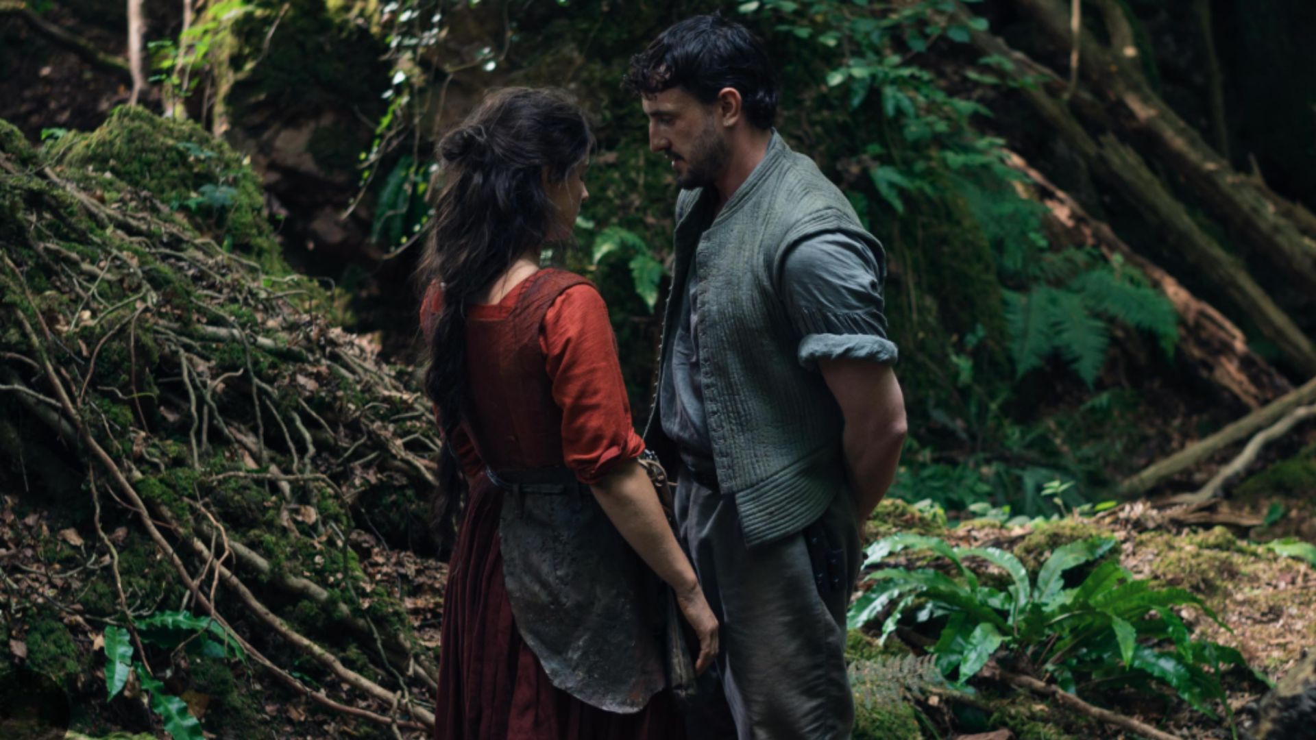 a promotional image of jessie buckley and paul mescal in hamnet