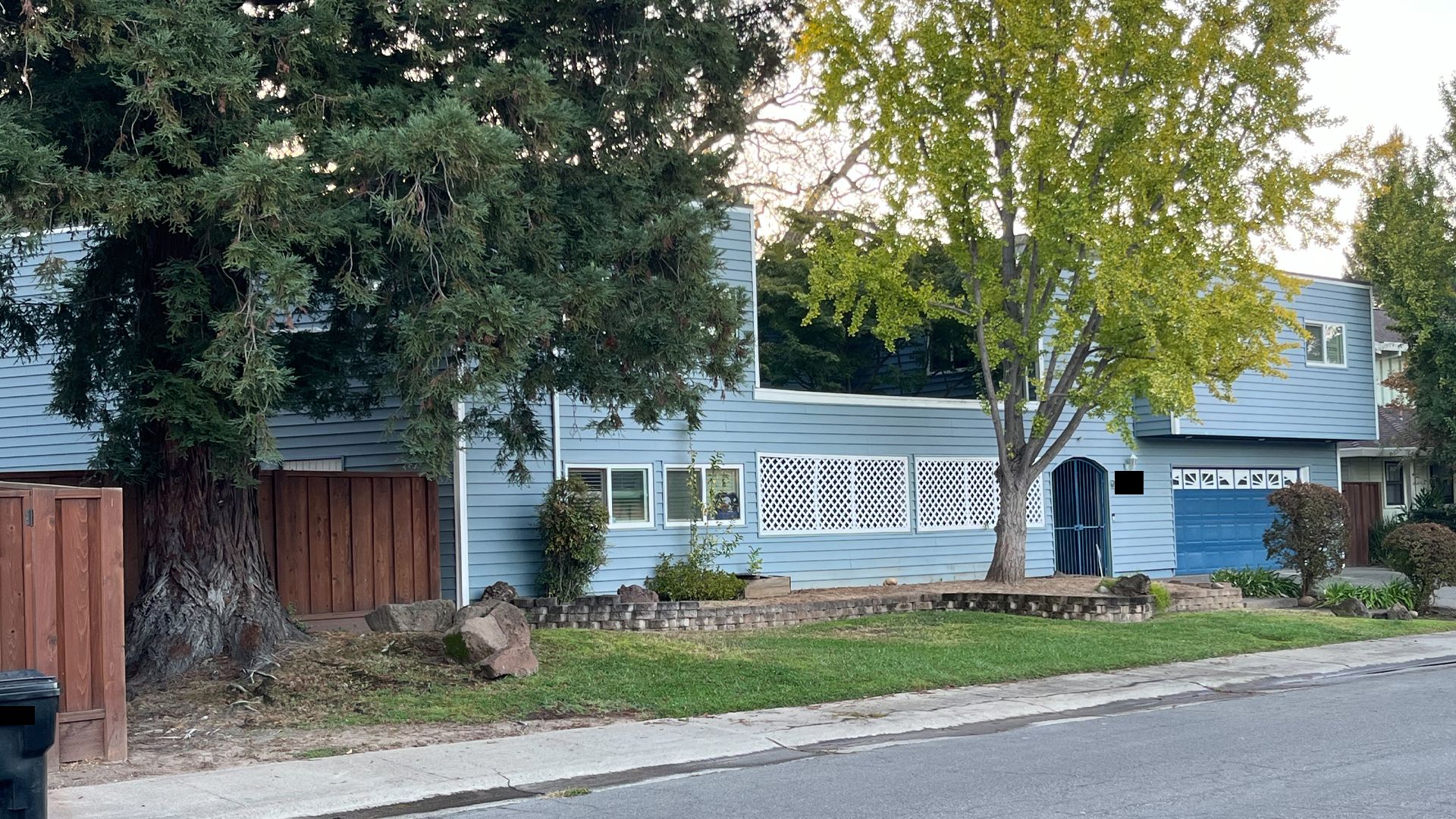 A long blue rectangular house