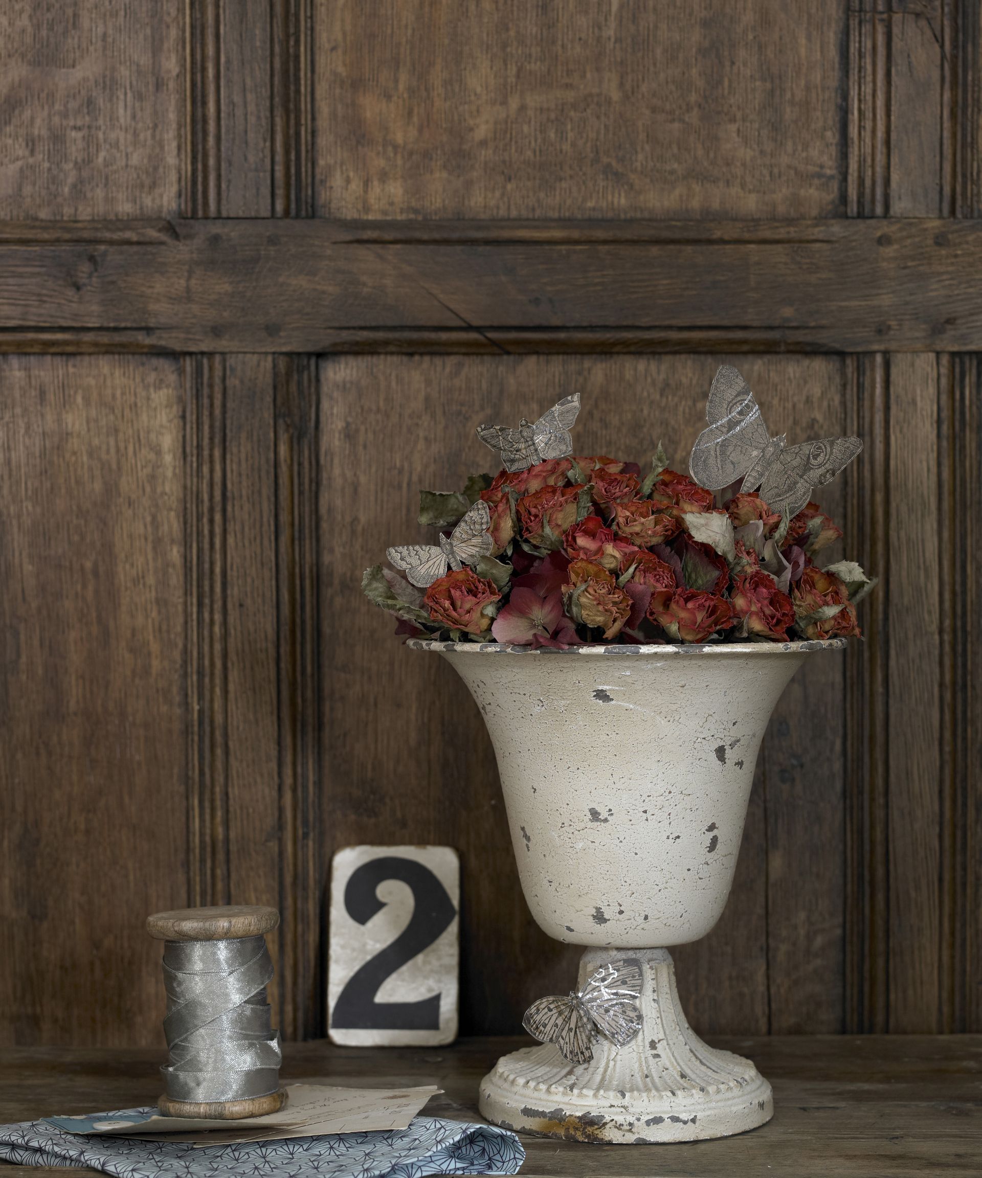 Dried roses in a large pot