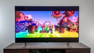 LG B4 OLED TV on table in living room