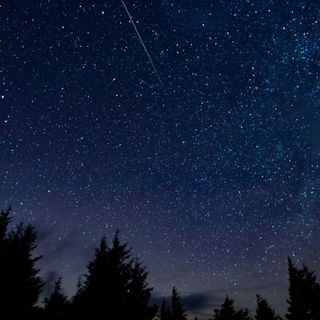 A meteor streaks across the sky in this 30-second exposure from the Perseid meteor shower on Aug. 13, 2015, in Spruce Knob, West Virginia.