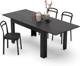 An extendable dining table