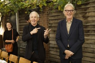 Bill Prince points to Paul Smith at Wallpaper* party