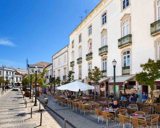 Cafes and shops on Praca da Republica in the Old Town, Tavira - Buy property in Europe
