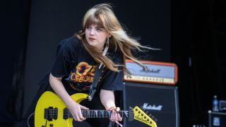 Debbie from Heriot looks out over the crowd from on stage