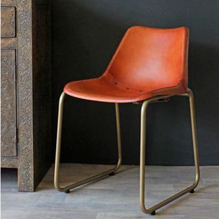 brown leather dining chair with brass effect legss