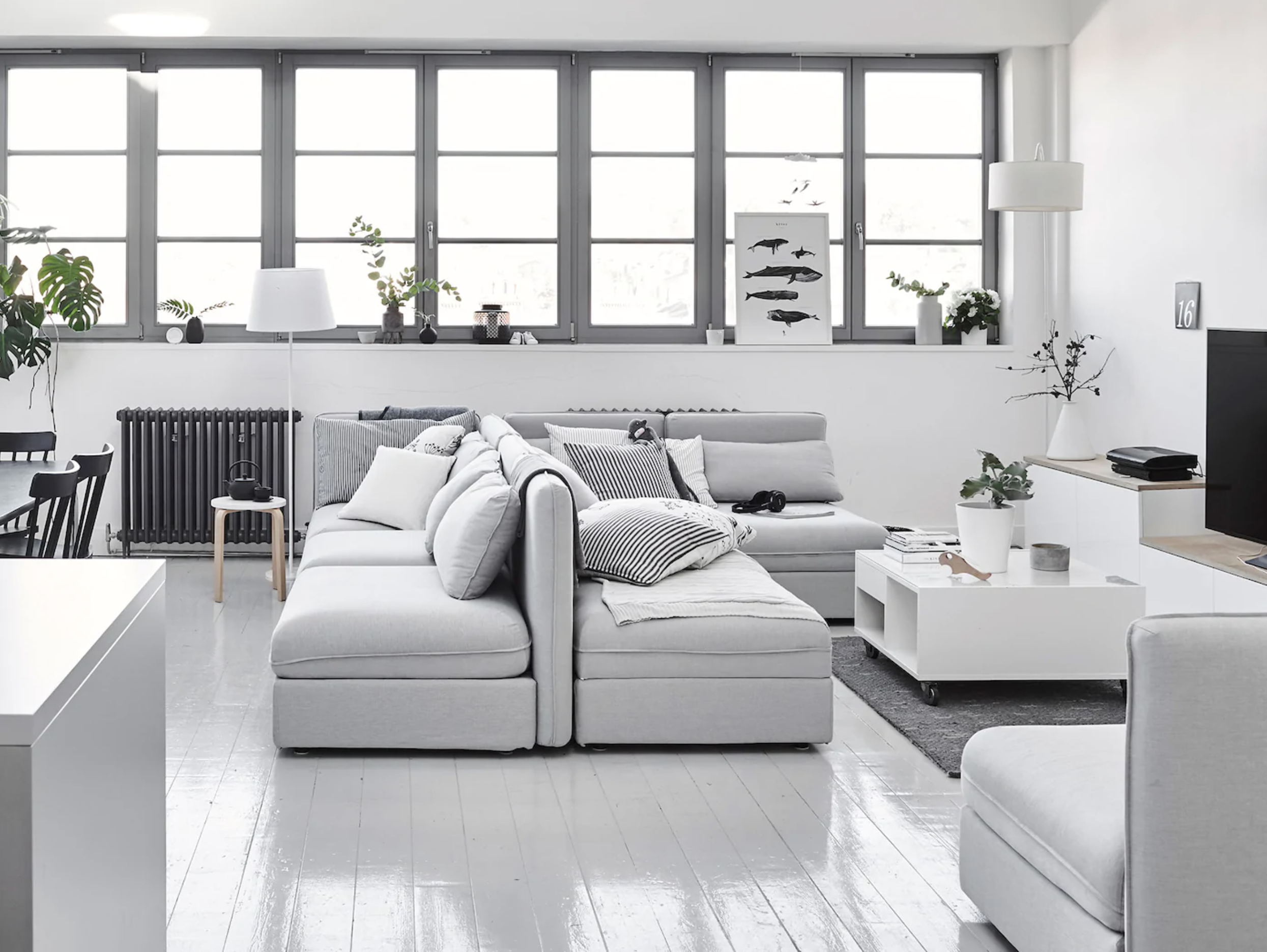 Grey loft apartment living room with sectional sofa