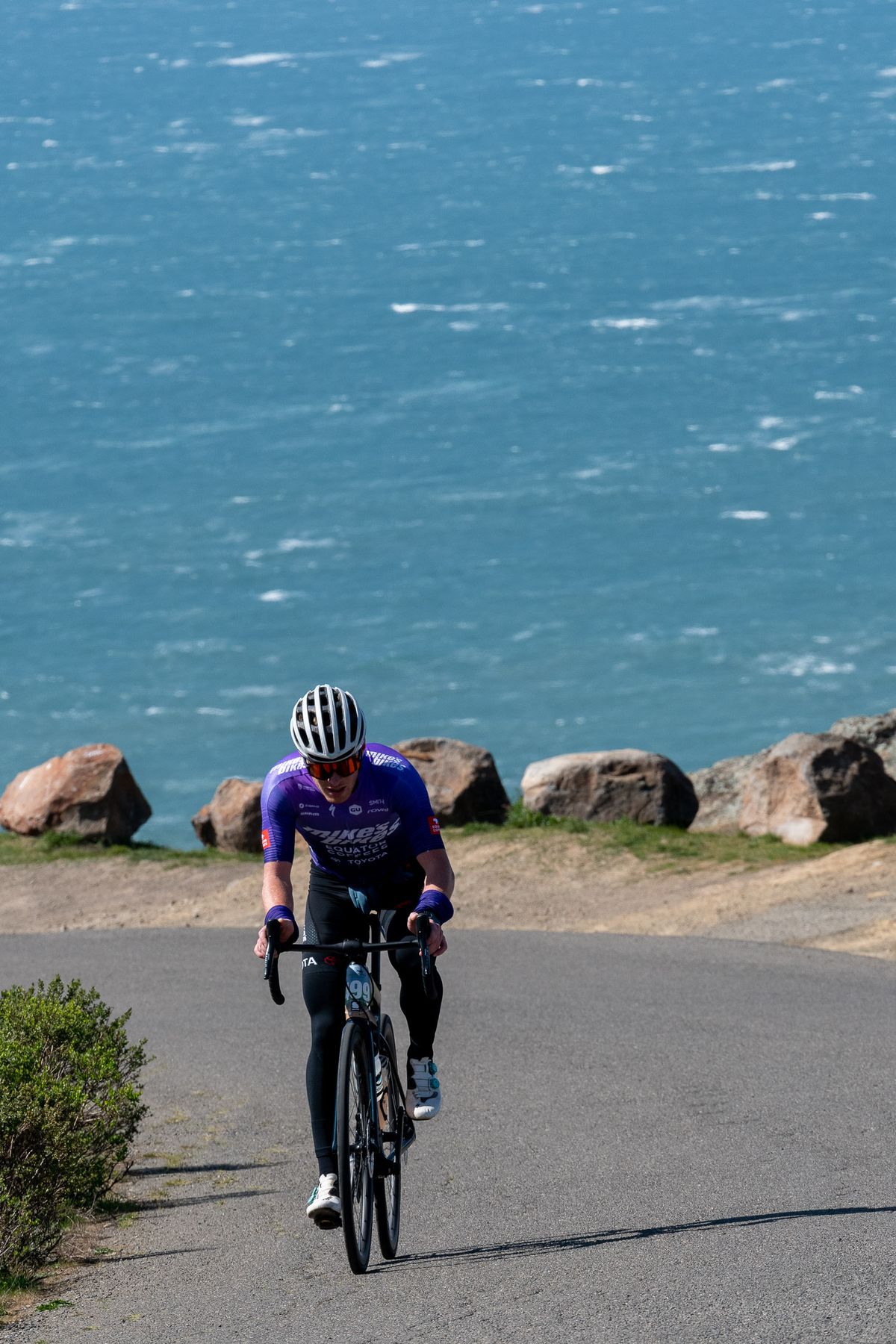 A rider climbs from the beach