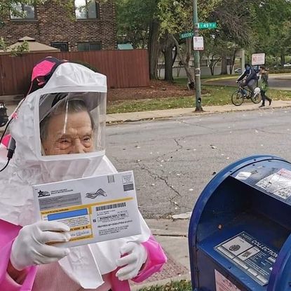 Bea Lumpkin mails her ballot.