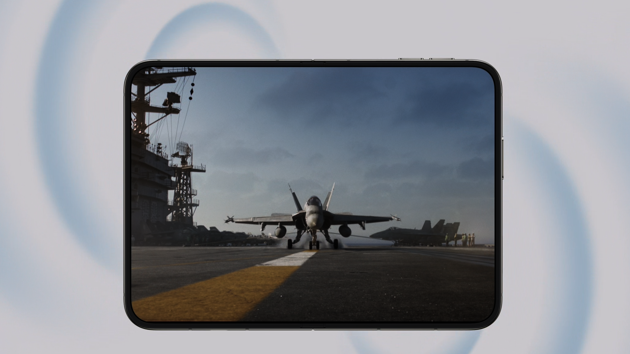 Apple iPhone Duo with Top Gun Maverick on screen with blue circles showing the direction of audio