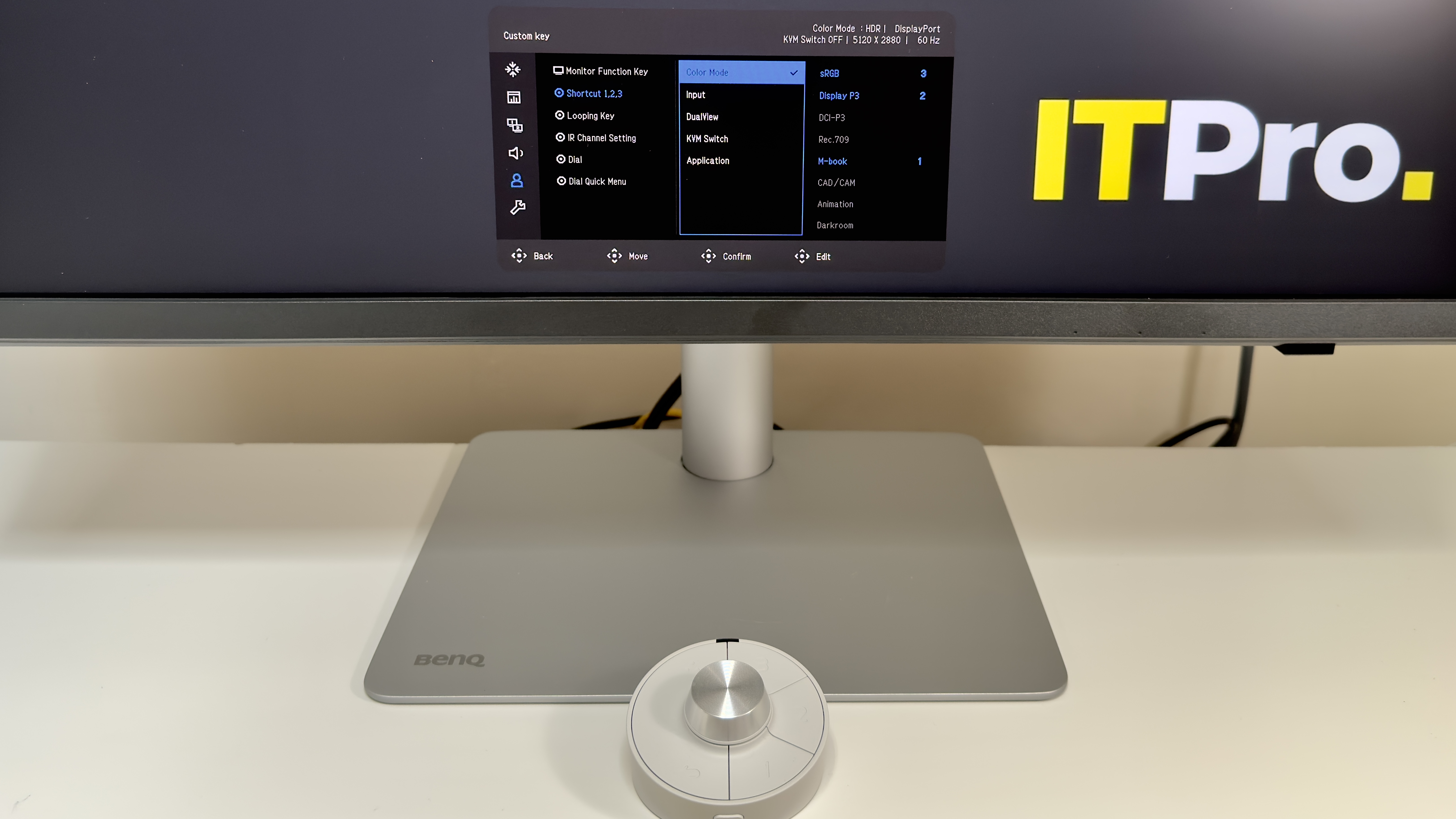 The BenQ PD2730S monitor on a desk