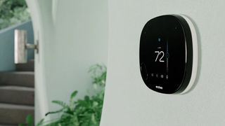 The Ecobee SmartThermostat attahed on a wall in a home