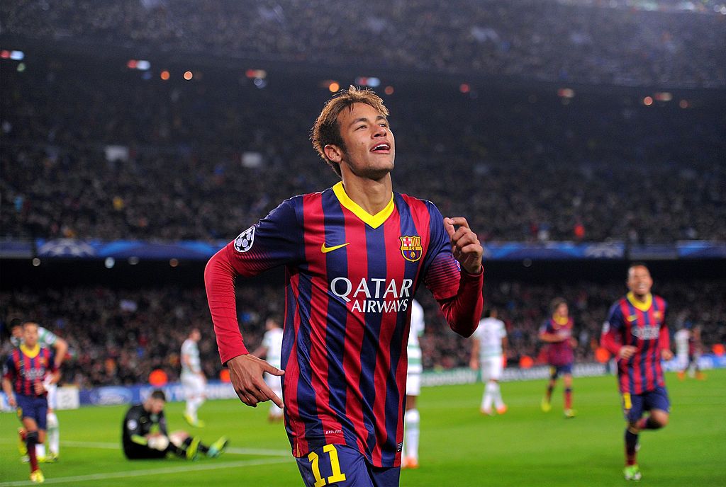 BARCELONA, SPAIN - DECEMBER 11: Neymar of FC Barcelona celebrates after scoring his team&#039;s 5th goal during the UEFA Champions League, Group H match between FC Barcelona and Celtic FC at the Camp Nou Stadium on December 11, 2013 in Barcelona, Spain. (Photo by Denis Doyle/Getty Images)