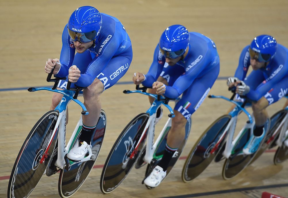 Italy's Liam Bertazzo, Italy's Simone Consonni, Italy's Elia Viviani and Italy's Francesco Lamon compete in the Men's Team pursuit qualification during the 2016 Track Cycling World Championships