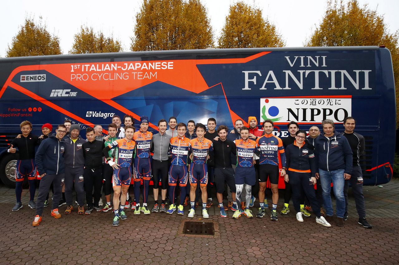 A few members of the team gather together for a photo