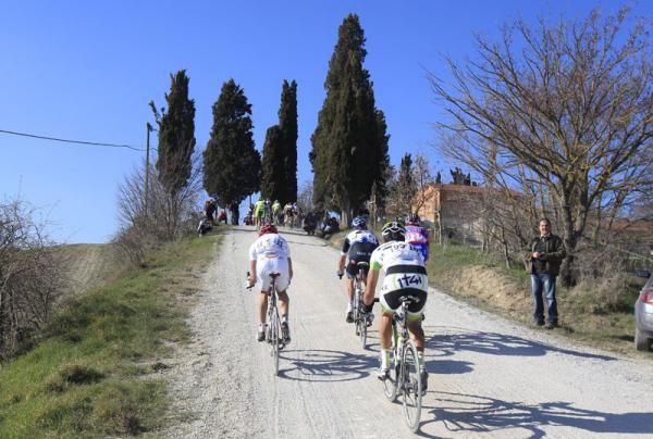 Ramon Sinkeldam (Project 1T4i) slips off the back of the lead group