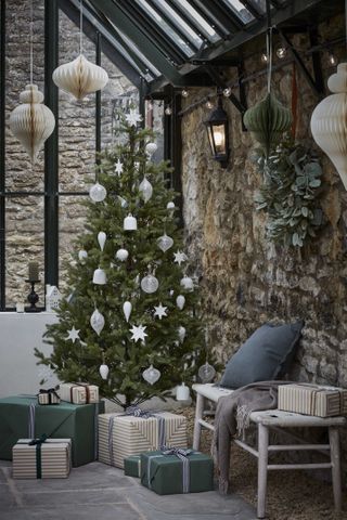 Neutral Christmas scene with paper honeycombs by Layered Lounge
