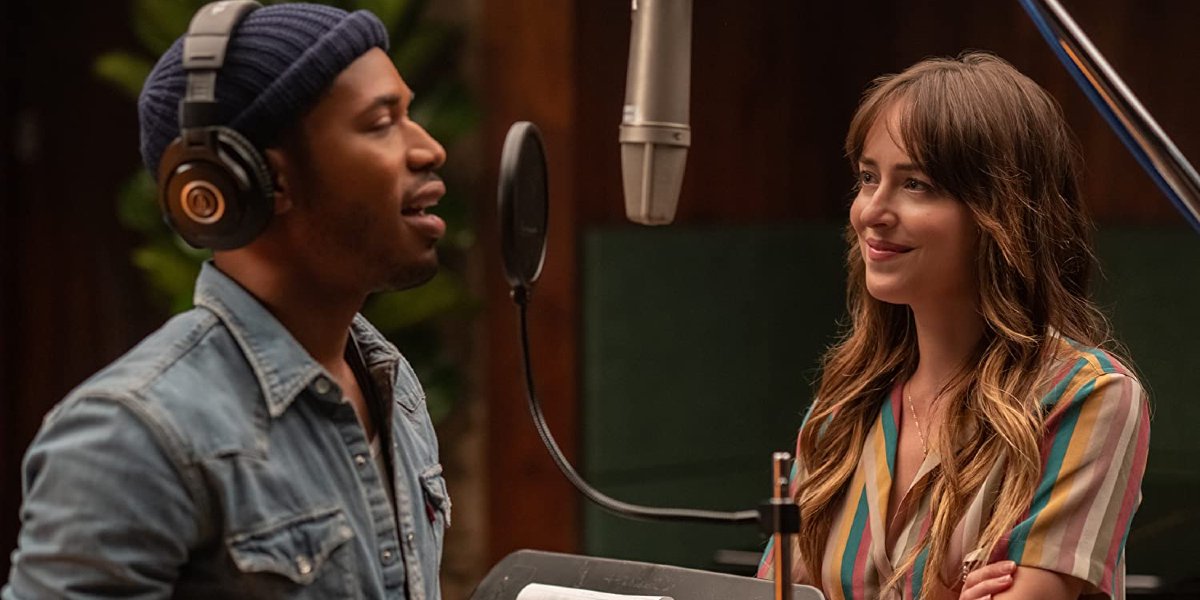 The High Note Kelvin Harrison Jr sings into the mic next to Dakota Johnson