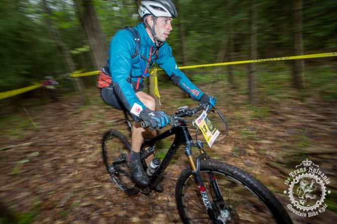 Daniel Sturm hits a wet section of singletrack during the enduro segment of Stage 5